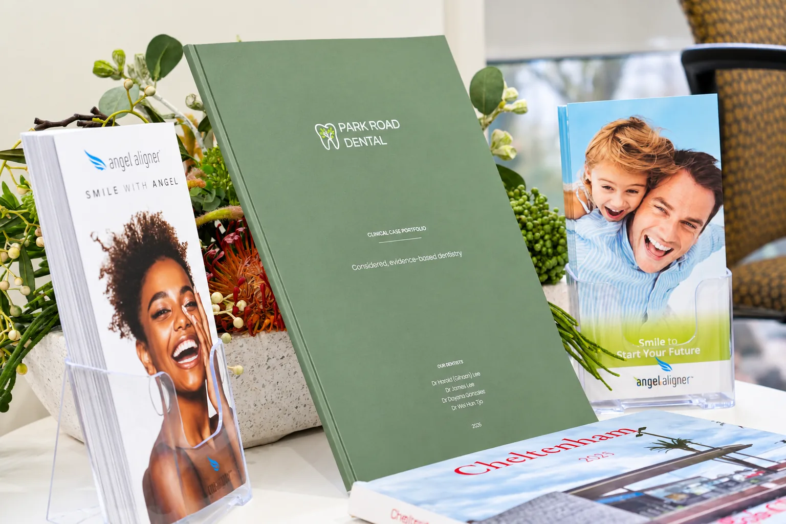 Angel Aligner brochures and the Park Road Dental clinical case portfolio on the reception display