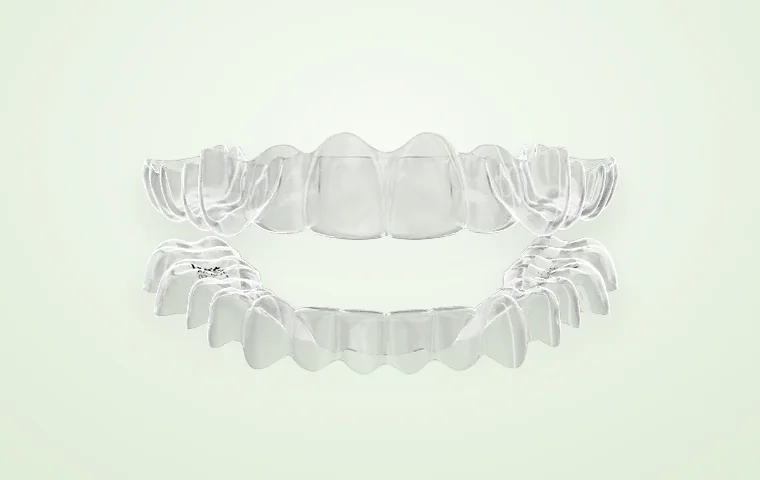 A clear retainer tray, worn at night to hold the result.